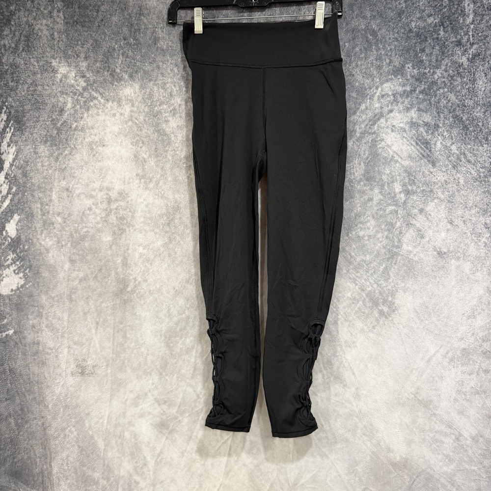 Lululemon Women’s Size 6 Black Leggings Crop Lace Mesh Cutout Hem Yoga Pants